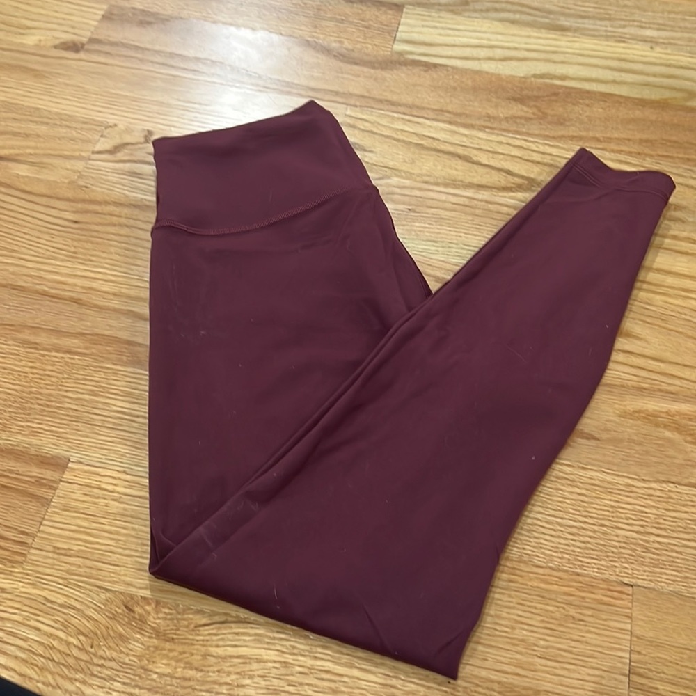 Maroon wunder train leggings size 12 25 inch used like new